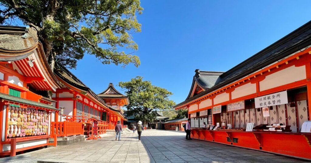 Charms area at Usa Jingu, with the Upper Shrine on the left and the amulet office on the right